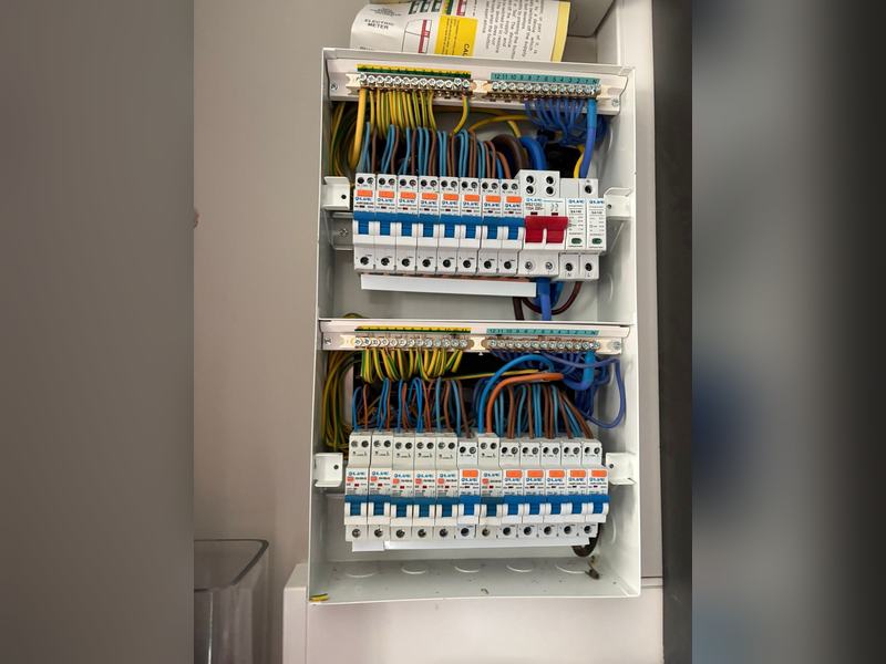 Twin consumer units installed and wired by Trio Construction Group