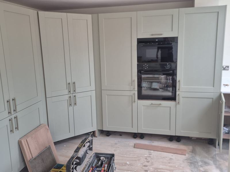 Kitchen Fitting by Trio Construction Group — photograph 2